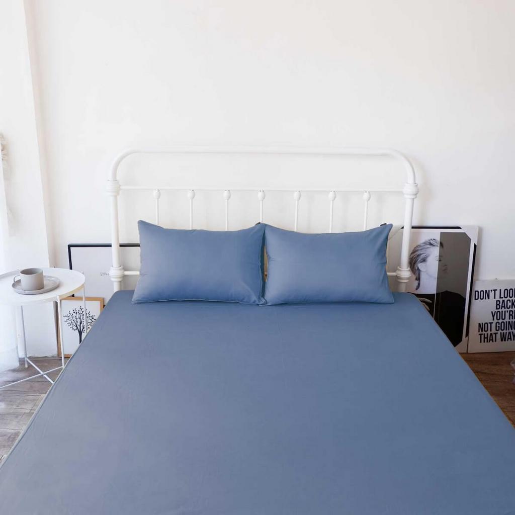 Ảnh cận cảnh vải Tencel 60s: bề mặt mịn và ánh bóng nhẹ.