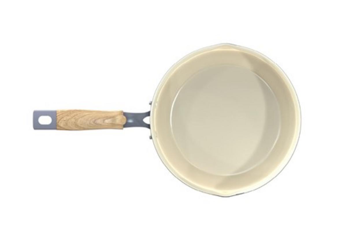 Đáy Inox 430 bắt từ, tương thích bếp từ; thân nhôm dẫn nhiệt đều.