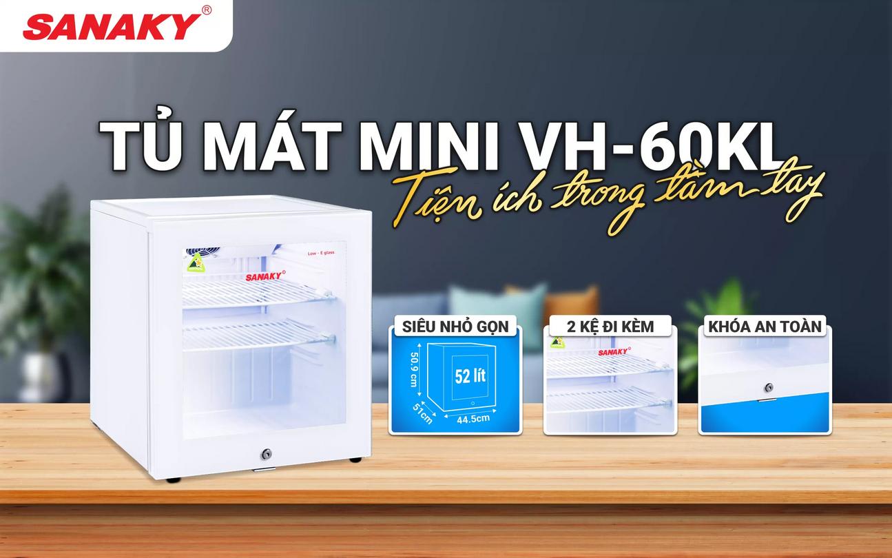 Hình minh hoạ dung tích 52 lít và kích thước nhỏ gọn; imagePrompt: "Mini fridge placed under a counter in a small apartment, with dimension lines and sample bottles inside."