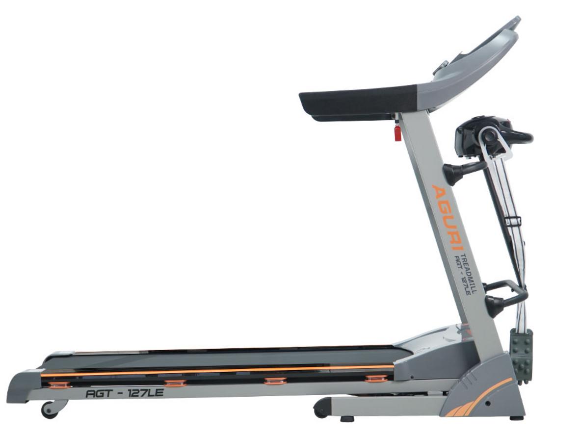 Độ dốc tự động 0%–15% (ảnh minh họa) - imagePrompt: "Side view of treadmill with incline mechanism highlighted and a person walking uphill simulation."