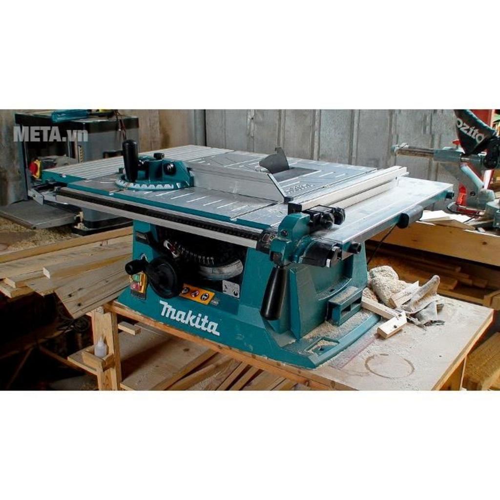 Động cơ 1.500W trên Makita MLT100 mang lại lực cắt ổn định.
