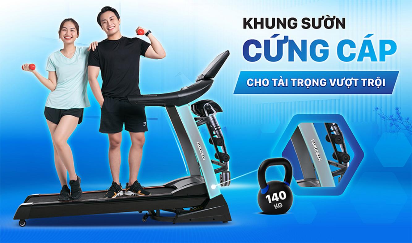 Động cơ 1.5HP — tốc độ lên tới 18 km/h để tập cardio hiệu quả (ảnh minh họa)   imagePrompt: "Close-up of the treadmill motor and console with speed display at 18 km/h; runner in background."