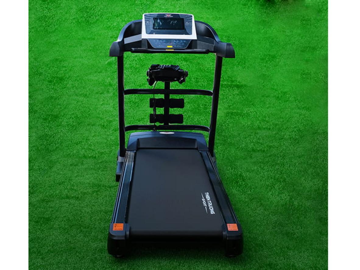 Động cơ DC mạnh mẽ cho hiệu suất ổn định khi chạy bộ trên HQ-9900 - Siêu Thị Đại Việt (ảnh minh họa) - show motor close-up, label specs: 4.0HP (peak 5.5HP).","imagePrompt":"Close-up of treadmill motor and control console, emphasis on power label, studio lighting.