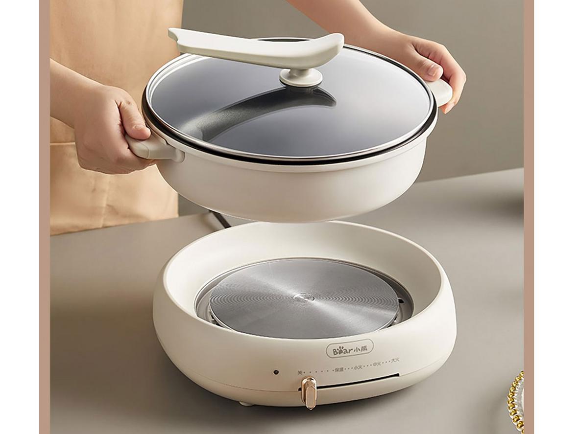 Thanh gạt 4 mức nhiệt dễ thao tác, phù hợp nhiều món.
