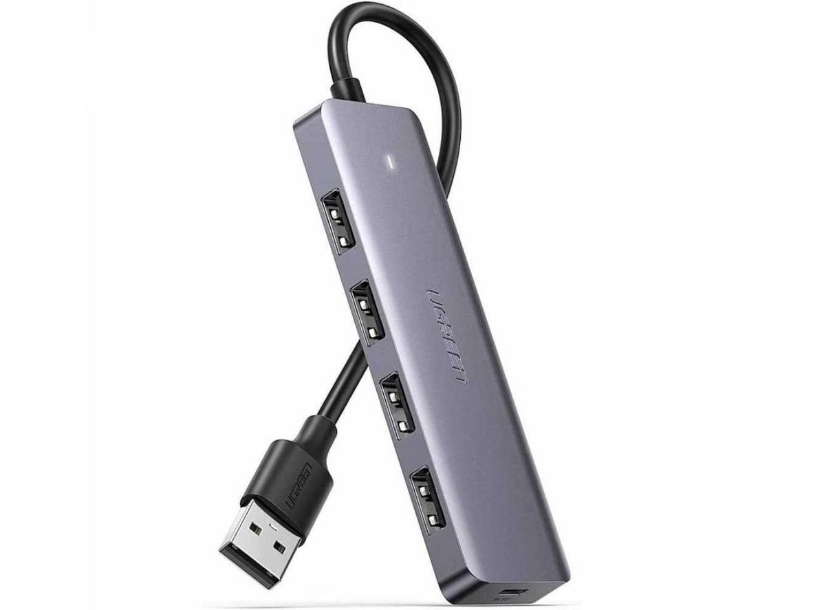 Hub USB Ugreen 50985 mở rộng 4 cổng, tốc độ 5Gbps và hỗ trợ cấp nguồn phụ 5V.