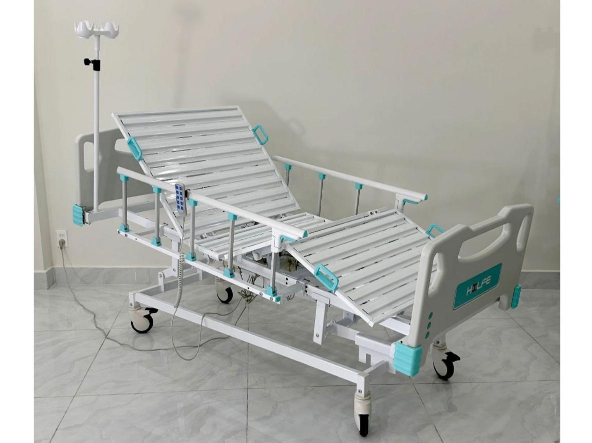 Giường điện y tế Hilfe MB-93.1 với điều khiển điện, tải trọng 250kg và khung thép sơn tĩnh điện.